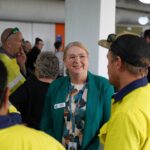 Frankston City Council CEO Tennille Bradley speaking with staff at a council event.