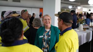 Frankston City Council CEO Tennille Bradley speaking with staff at a council event.