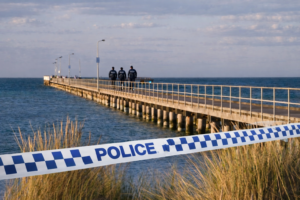 Police at Rye Pier on the Mornington Peninsula after a man’s body was found floating in the water on Thursday morning.